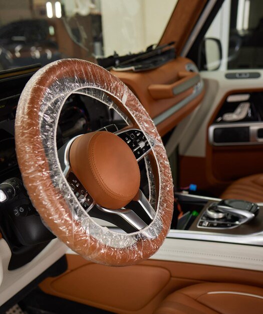 macro-shot-steering-wheel-car